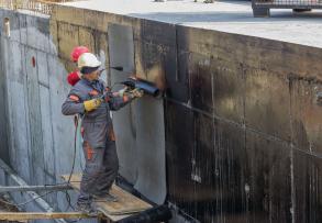 POST-APPLIED WATERPROOFING MEMBRANES